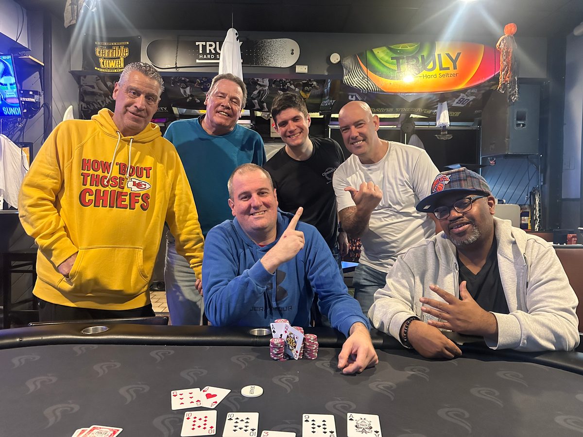 Winner and players at Raise the Bar