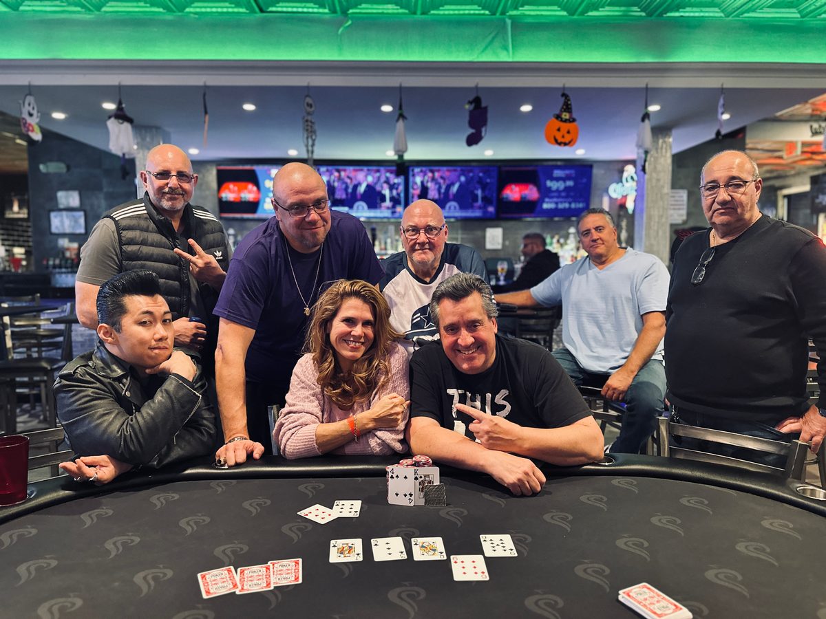 Winner and players at Bravo Pizza & Sports Bar